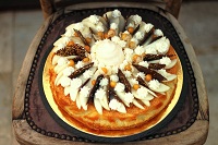             Bon rond d'or (pain à la farine de blé kamut, olives noires au sirop de romarin et noix)